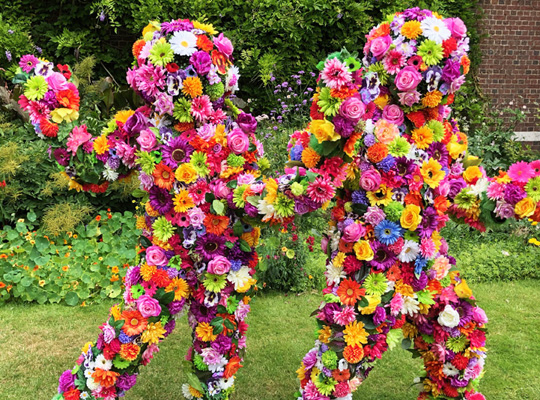 SPRING THEMED ENTERTAINMENT + FLOWER THEMED PERFORMERS - LIVING FLOWER MEN BLOSSOM IN HUGS WALKABOUT FLOWER MEN ACT