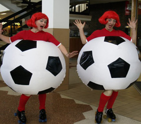 OLYMPIC THEMED ENTERTAINMENT - FOOTBALL THEMED  ROLLER SKATERS TO HIRE 