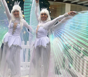 NUTCRACKER THEMED ENTERTAINMENT TO BOOK - ICE PRINCESS ROLLER SKATING DUO -LED ICE QUEEN ROLLER SKATING ACT HIRE