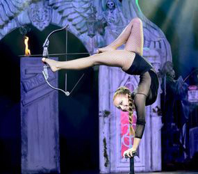Valentines Themed Staged Entertainment - Cupid Foot Archer Acrobat to hire UK