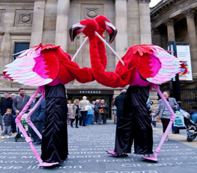 Flamingo Puppet Stilts - Alice in Wonderland Stilt Walker hire UK