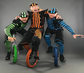 BOOK FESTIVAL ENTERTAINMENT - FUN UNICYCLE TRIO OR UNICYCLE DUO TO HIRE 