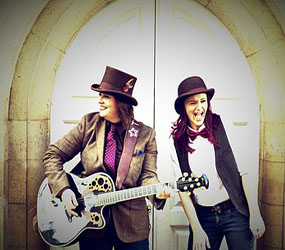 FESTIVAL THEMED ENTERTAINMENT ACOUSTIC GUITAR AND SINGER DUO ROAMING ENTERTAINMENT
